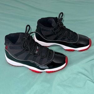 Bred Jordan 11s - Size 8.5 in Men’s / Size 10 in Women’s
